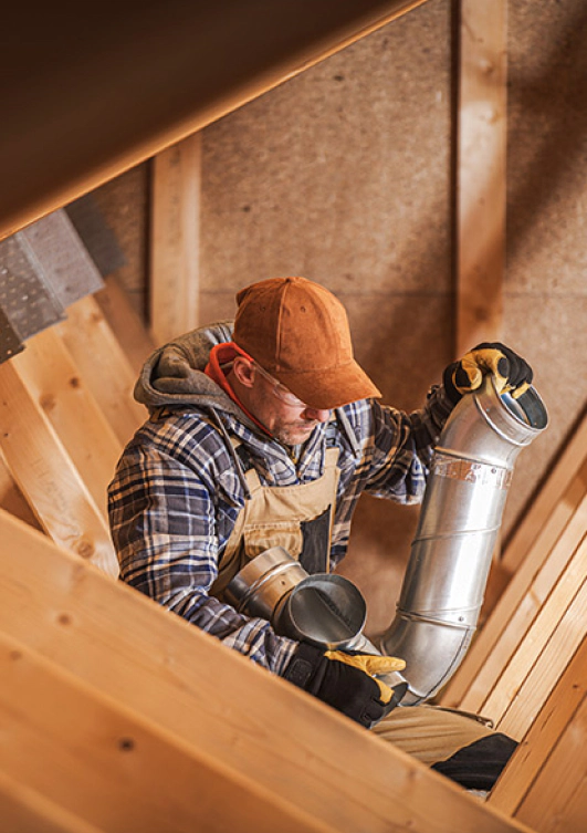 hvac technician installing duct work hudson fl